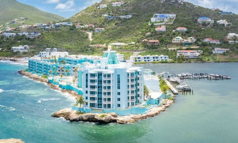 Hotel exterior with sea view and beach access at Oyster Bay Beach Resort.