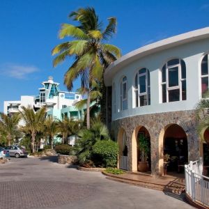 Hotel exterior and entrance at Oyster Bay Beach Resort.