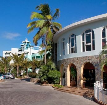 Hotel exterior and entrance at Oyster Bay Beach Resort.