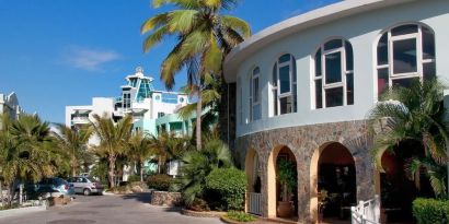 Hotel exterior and entrance at Oyster Bay Beach Resort.