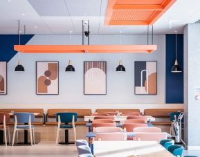 Coworking and dining space at Ibis Budget Manchester Airport.