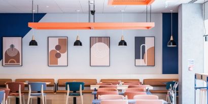 Coworking and dining space at Ibis Budget Manchester Airport.