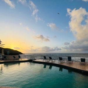 Sunset reflecting off the waters of the Infinity Pool at the Oyster Bay Resort in St. Maarten.