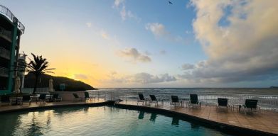 Sunset reflecting off the waters of the Infinity Pool at the Oyster Bay Resort in St. Maarten.