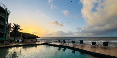 Sunset reflecting off the waters of the Infinity Pool at the Oyster Bay Resort in St. Maarten.