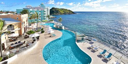 Daytime angle of glistening Infinity Pool at Oyster Bay Resort in St. Maarten.