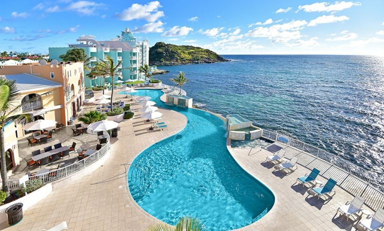 Daytime angle of glistening Infinity Pool at Oyster Bay Resort in St. Maarten.