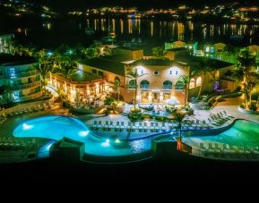 Nighttime lights of the Infinity Pool at Oyster Bay Resort in St. Maarten.