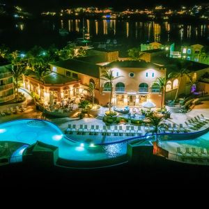 Nighttime lights of the Infinity Pool at Oyster Bay Resort in St. Maarten.