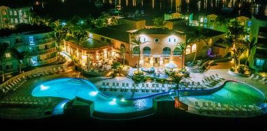 Nighttime lights of the Infinity Pool at Oyster Bay Resort in St. Maarten.