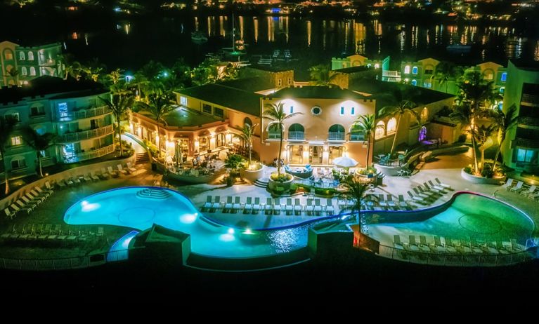 Nighttime lights of the Infinity Pool at Oyster Bay Resort in St. Maarten.