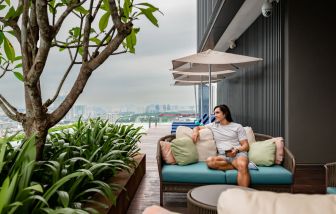 Outdoor pool with pool chairs at Capri By Fraser Bukit Bintang.