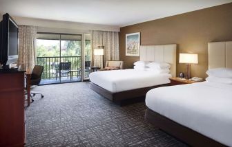 Two queen beds with balcony at DoubleTree By Hilton Ontario Airport.