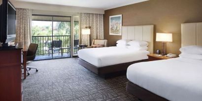 Two queen beds with balcony at DoubleTree By Hilton Ontario Airport.