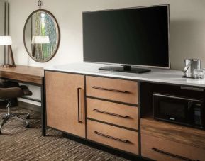 Work space with desk and TV at DoubleTree By Hilton Ontario Airport.