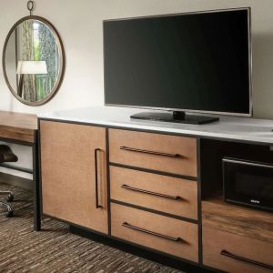 Work space with desk and TV at DoubleTree By Hilton Ontario Airport.