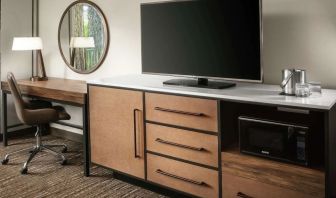 Work space with desk and TV at DoubleTree By Hilton Ontario Airport.