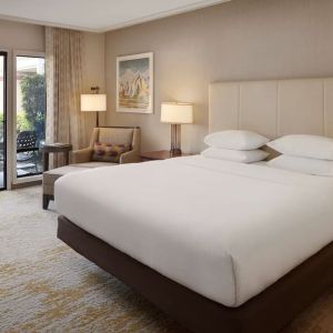 Romantic king room with natural light at DoubleTree By Hilton Ontario Airport.