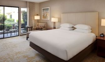 Romantic king room with natural light at DoubleTree By Hilton Ontario Airport.