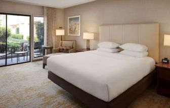 Romantic king room with natural light at DoubleTree By Hilton Ontario Airport.