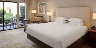 Romantic king room with natural light at DoubleTree By Hilton Ontario Airport.