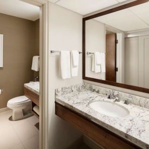 Day room with guest bathroom at DoubleTree By Hilton Ontario Airport.