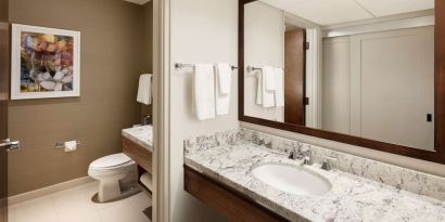 Day room with guest bathroom at DoubleTree By Hilton Ontario Airport.