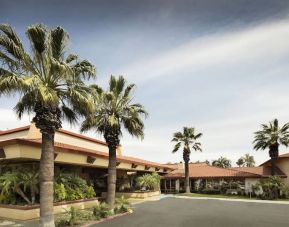 Hotel exterior and parking at DoubleTree By Hilton Ontario Airport.