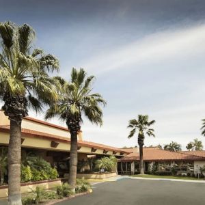 Hotel exterior and parking at DoubleTree By Hilton Ontario Airport.