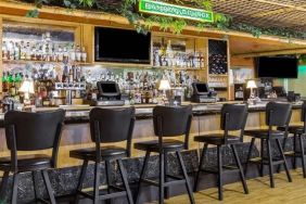 Hotel bar area at Uptown Oasis San Jose Airport.