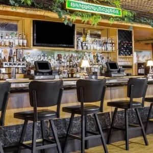 Hotel bar area at Uptown Oasis San Jose Airport.