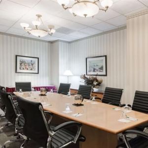 Professional meeting room at Uptown Oasis San Jose Airport.