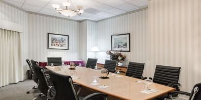 Professional meeting room at Uptown Oasis San Jose Airport.