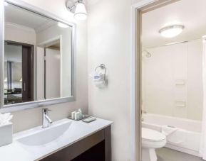 Guest bathroom with shower at Uptown Oasis San Jose Airport.