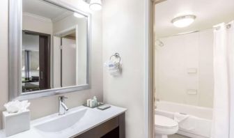 Guest bathroom with shower at Uptown Oasis San Jose Airport.