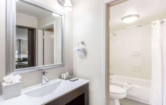 Guest bathroom with shower at Uptown Oasis San Jose Airport.