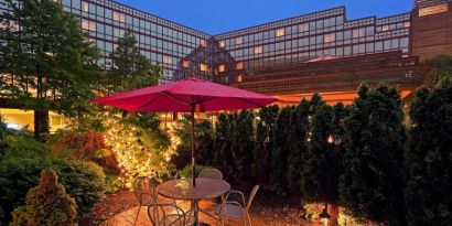 Outdoor terrace at Laguardia Plaza Hotel.