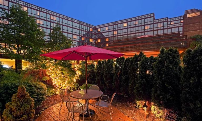 Outdoor terrace at Laguardia Plaza Hotel.