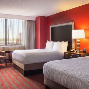 Two queen beds at Laguardia Plaza Hotel.