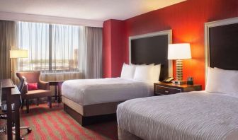 Two queen beds at Laguardia Plaza Hotel.