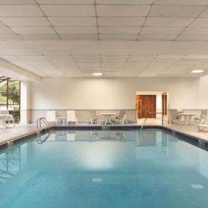 Indoor pool available at Laguardia Plaza Hotel.