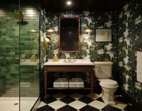 Guest bathroom with shower at Graduate By Hilton Princeton.