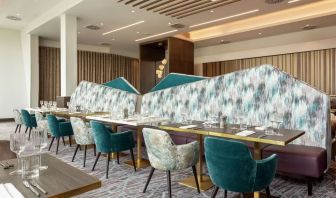 Dining room with natural light at Hilton Aberdeen TECA.