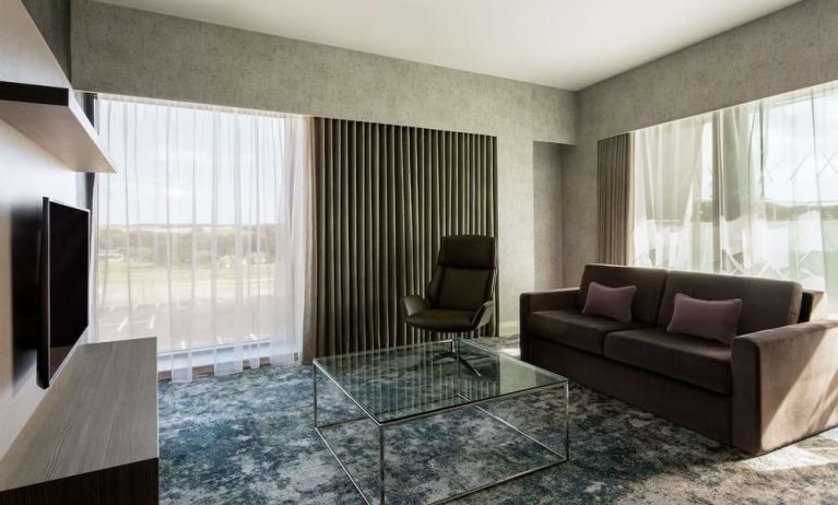 Presidential suite with lounge area at Hilton Aberdeen TECA.