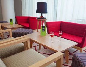 Coworking lounge at Hampton By Hilton London Gatwick Airport.