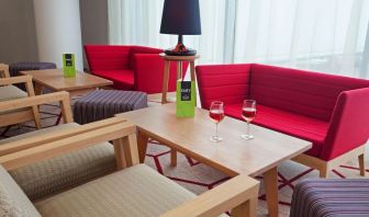 Coworking lounge at Hampton By Hilton London Gatwick Airport.