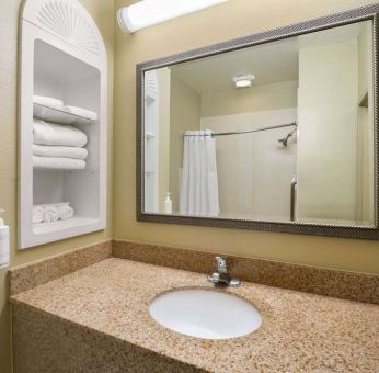 Guest bathroom with shower at Hotel Marguerite.