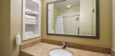 Guest bathroom with shower at Hotel Marguerite.