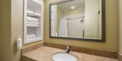 Guest bathroom with shower at Hotel Marguerite.