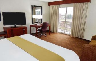 Day use room with TV and work space at Radisson Hotel Akron/Fairlawn.